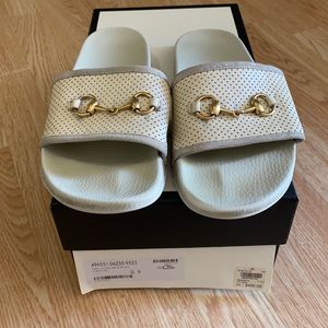 Men’s authentic Gucci slides